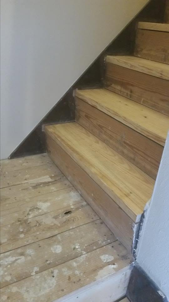 Wood staircase stripped before refinishing