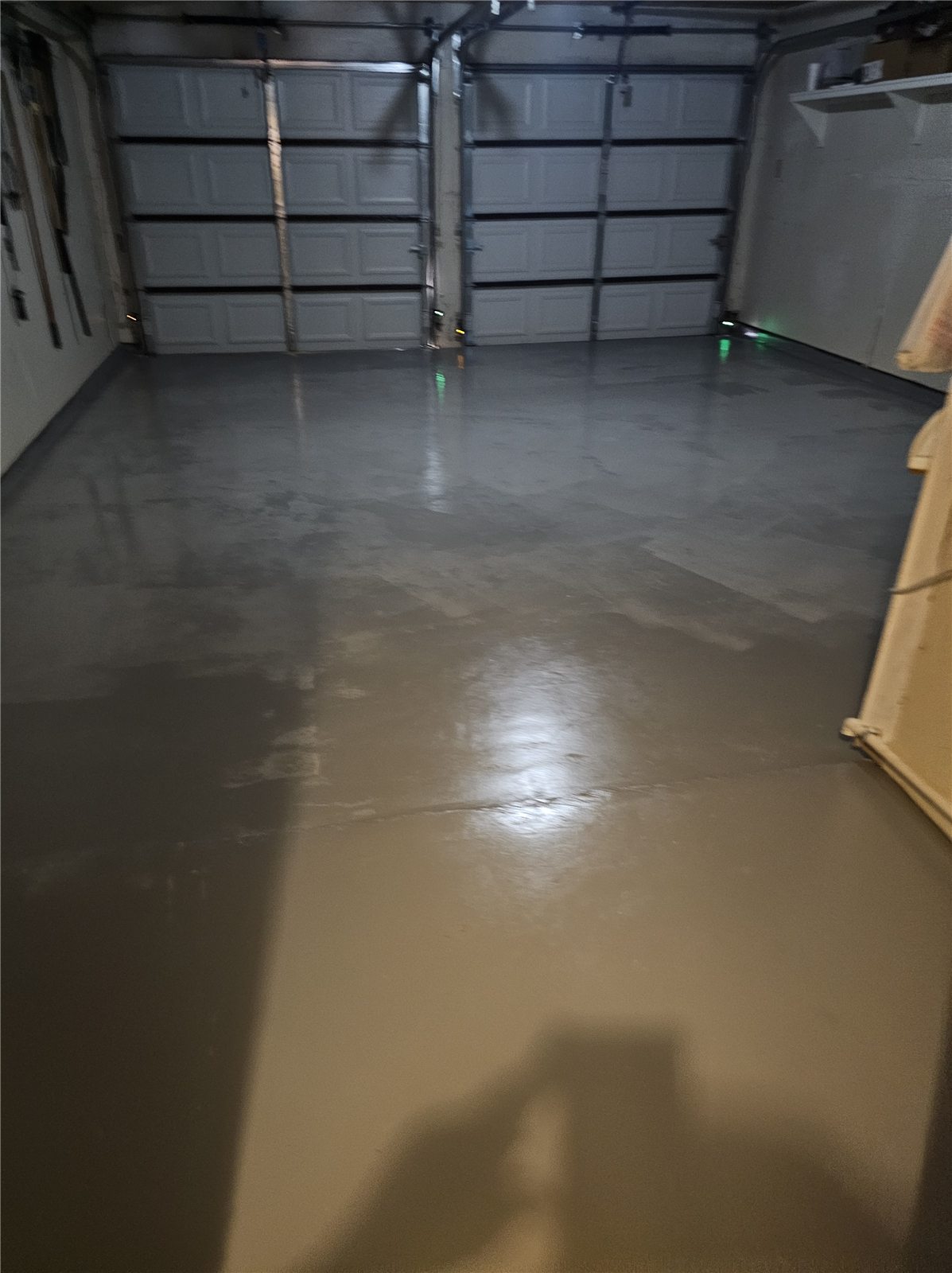 Completed gray epoxy garage floor