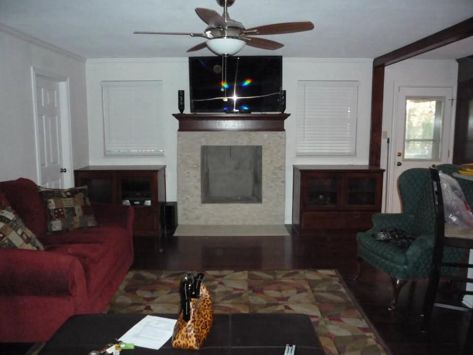 Completed fireplace and built-in media wall after remodeling